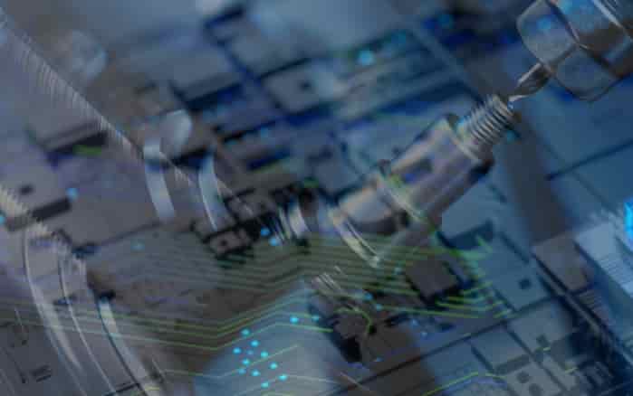 Industrial sensor or transducer over an electronic circuit board, representing automation control and instrumentation.