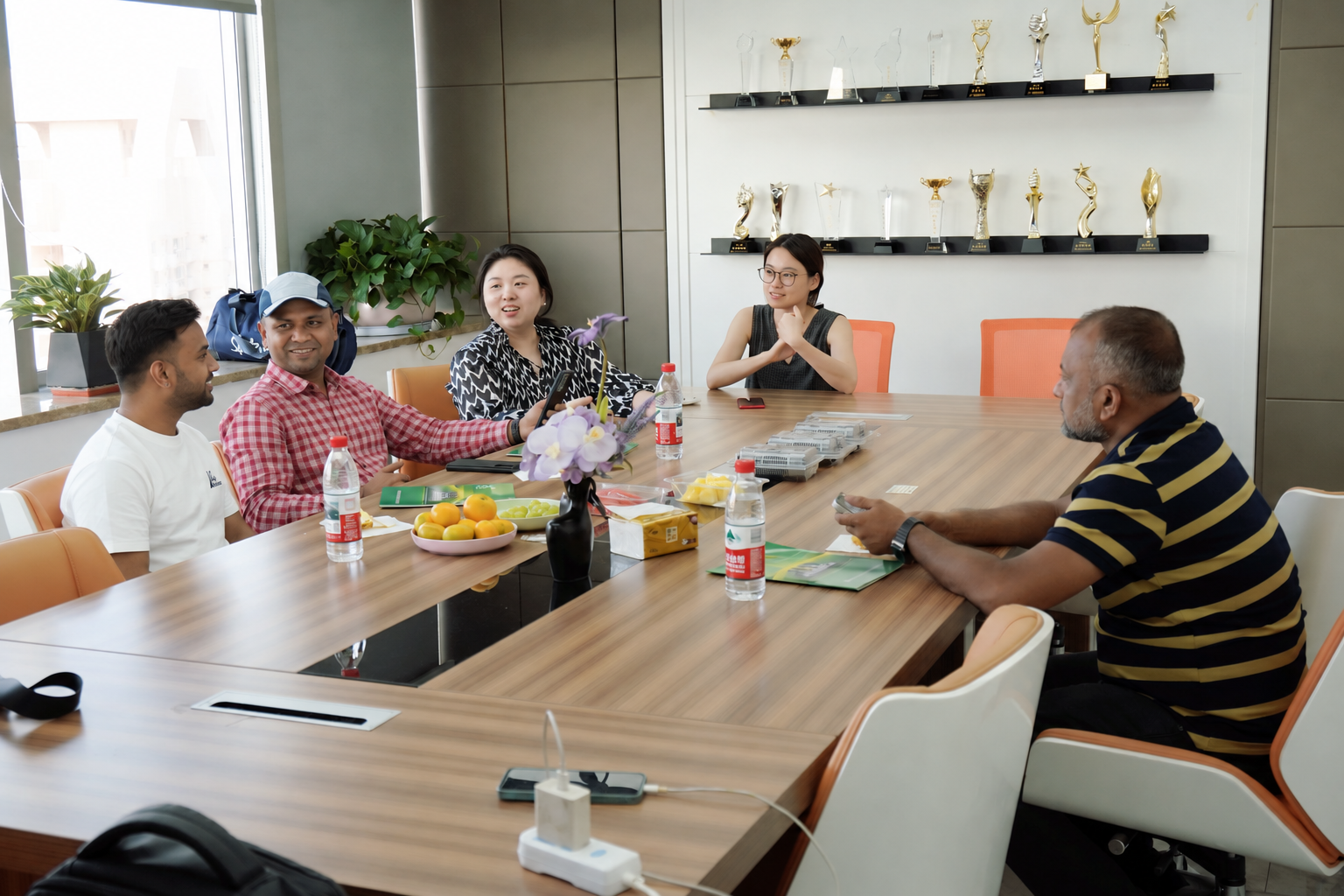 Bangladeshi customers discussing requirements with the Amikon team