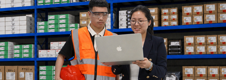 Amikon warehouse team reviewing quality and inventory information